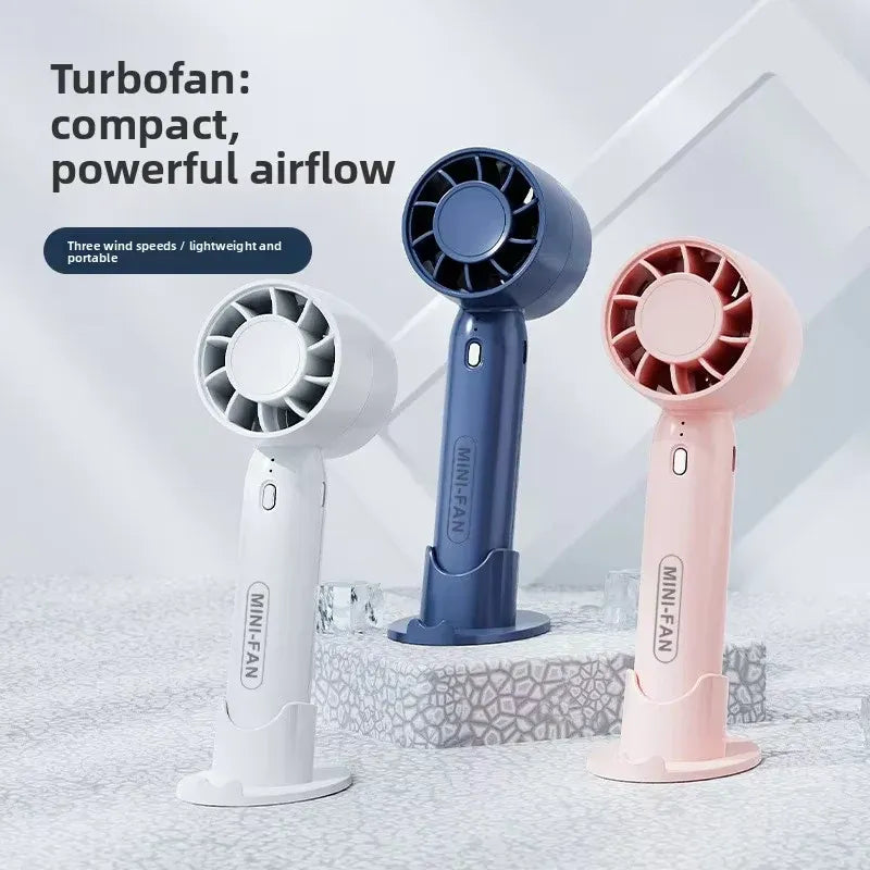 Portable Handheld Mini Fan with Phone Holder Dubai UAE rechargeable mini fan with built in phone holder for travel office home and outdoor use