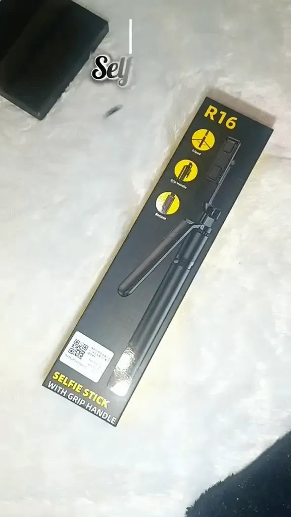 Selfie Stick Tripod with Grip Handle and Bluetooth Dubai UAE portable smartphone selfie stick tripod with ergonomic grip handle and Bluetooth remote for photos videos vlogging and travel