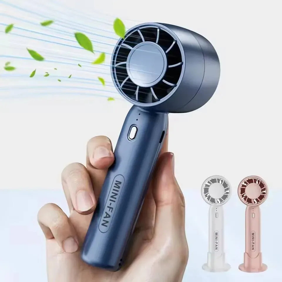 Portable Handheld Mini Fan with Phone Holder Dubai UAE rechargeable mini fan with built in phone holder for travel office home and outdoor use