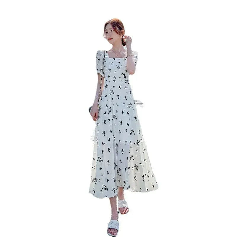 White Floral Print Ruffle Dress for Women Dubai UAE elegant women's floral dress with ruffle design for casual outings parties and summer fashion