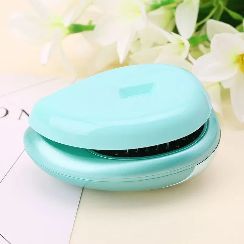 Electric Ionic Massage Comb with Vibration Dubai UAE electric ionic hair massage comb with vibrating scalp massage for hair care relaxation and everyday grooming