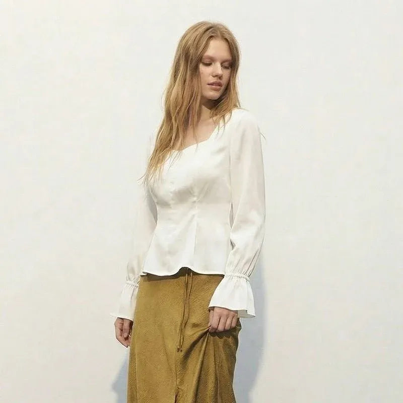 Elegant Off White Puff Sleeve Pullover Top Dubai UAE women's off white puff sleeve top with elegant design for casual wear office outfits and everyday fashion