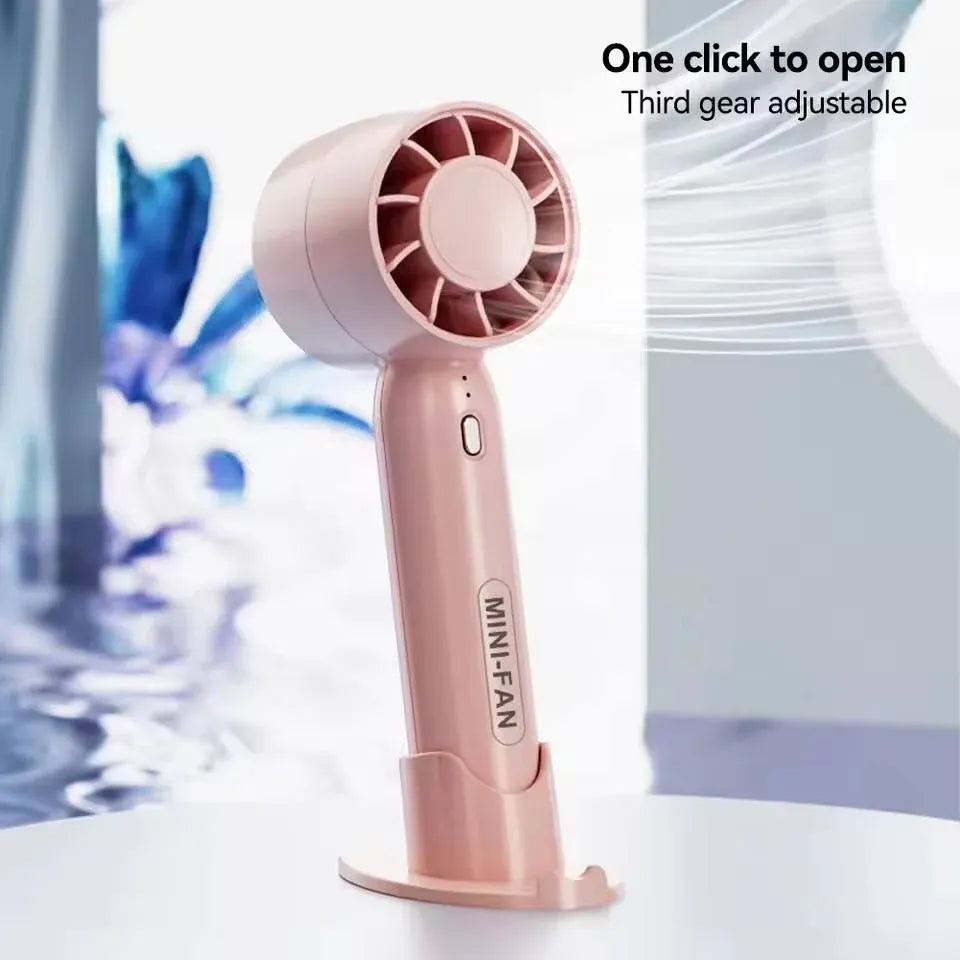 Portable Handheld Mini Fan with Phone Holder Dubai UAE rechargeable mini fan with built in phone holder for travel office home and outdoor use